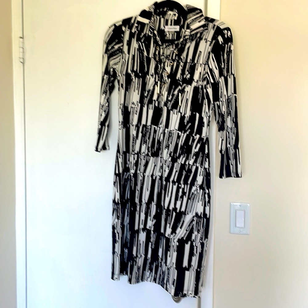 Calvin Klein, cocktail dress. Black & White. Knee high. Very soft fabric. Size 4